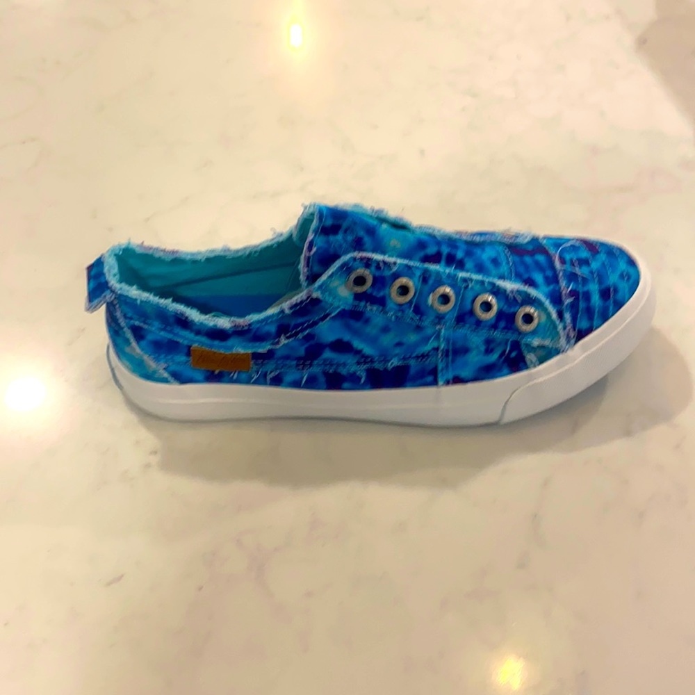 Brand new, never worn slip on sneakers